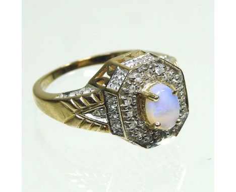 A 9 carat gold opal and diamond cluster ring, with diamond set shoulders, size P, 6.5g, boxed