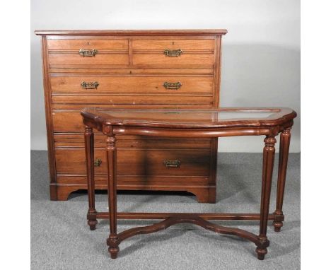 A large Edwardian chest, on a plinth base, 112cm wide, together with a glass top console table, 107cm wide (2)