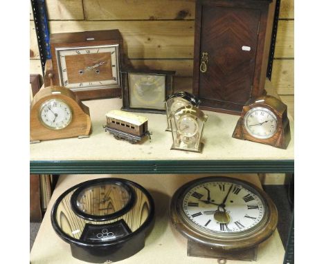 A 19th century walnut cabinet, 24cm wide, together with a dial clock, another various mantel clocks and a tinplate toy train 