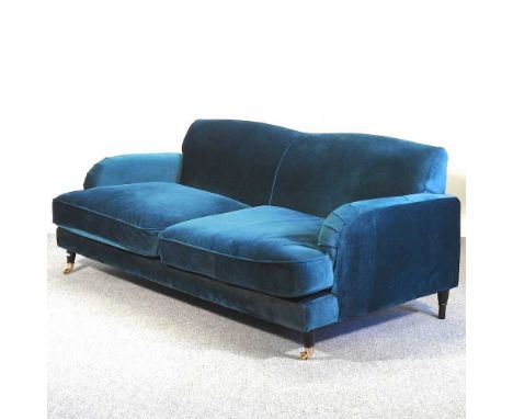 A modern turquoise upholstered sofa188w x 100d x 78h cmLooks to be quite new, but has various light stains, marks and is dirt
