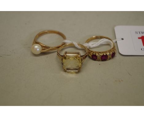 A ruby and diamond gold gypsy ring, hallmarked 18ct, 3.1g all in; together with a citrine gold ring, stamped 9ct; and a pearl