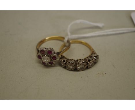 A ruby and diamond floral gold ring, stamped 18ct; together with an illusion set five stone diamond gold ring, stamped plat/1