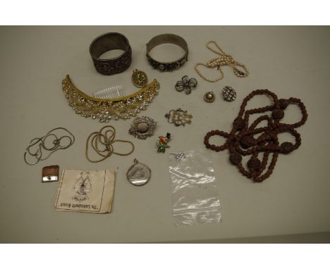 A small selection of silver and costume jewellery, to include silver &amp; enamel brooches and a glass set metal tiara. 