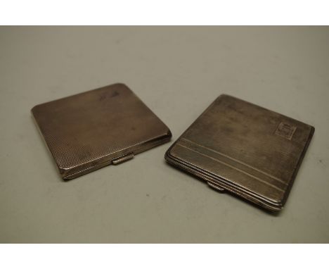 Two silver engine turned cigarette cases,&nbsp;238g all in. 