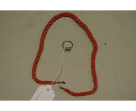 A coral bead necklace,&nbsp;44cm; together with a yellow metal ring set turquoise and split pearls with hinged top. 