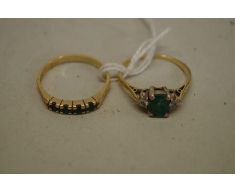 An emerald and diamond gold ring; together with another example set four inline emeralds, both hallmarked 18ct, 6.2g total we