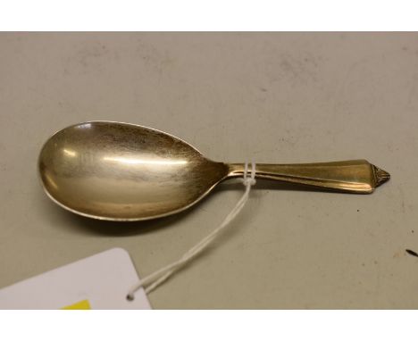 A silver caddy spoon, by&nbsp;F &amp; W,&nbsp;Sheffield 1966, 16g. 