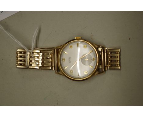A vintage Vertex Review 9ct gold manual wind wristwatch,&nbsp;33mm, with 9ct metal core bracelet, box. 
