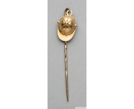 Gold gentleman's tie stick pin in the form of a jockey cap,
unhallmarked, probably 9ct., the cap on a ring suspension from th