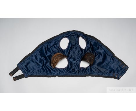The visor worn by Chaumiere when he won the John Smith's Magnet Cup at York in successive years in 1985 and 1986,
navy blue v