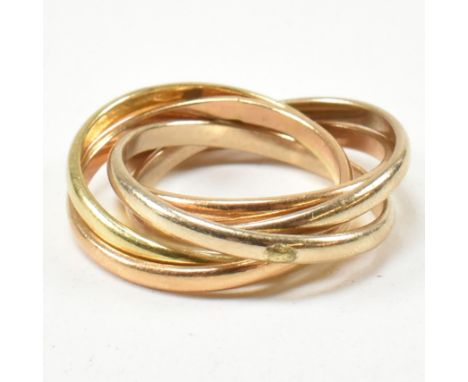 An Italian 18ct gold five band puzzle ring. The ring formed with subtle graduating colours of gold. Marked 750 *160 A. Weight