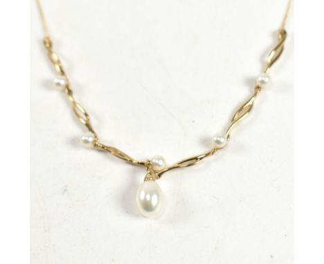 A hallmarked 9ct gold, cultured pearl drop and diamond necklace. The necklace having a cultured pearl drop surmounted by a ro
