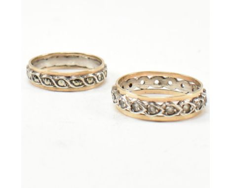 Two 9ct gold and silver, marcasite and white stone band rings. The rings to include a gold band ring having central silver ro