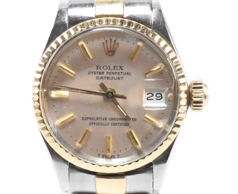 A Rolex Oyster Perpetual Datejust ladies wristwatch. The watch with champagne dial, baton markers having sweep hands. Marked 