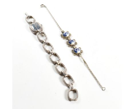 A hallmarked silver Rotary watch together with a hallmarked 835 silver filigree delft panel bracelet. The ladies Rotary watch