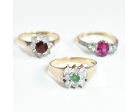 Three 9ct gold and gem set rings. The rings to include a hallmarked 9ct gold, garnet and CZ cluster ring, hallmarked for Birm