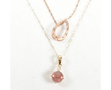 A 9ct rose gold pendant necklace together with a 9ct yellow gold and gem set pendant necklace. The necklaces to include an It