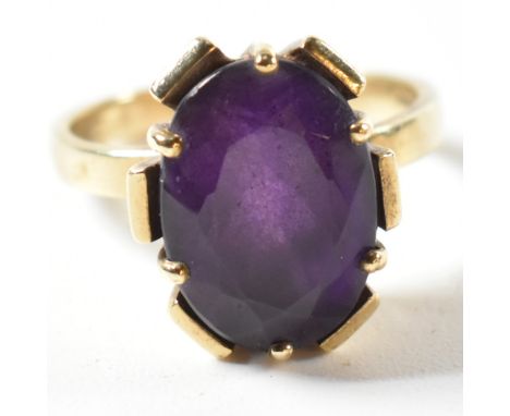 A hallmarked 9ct gold and amethyst ring. The ring bearing import hallmark for London 1979. Weight 5g. Size N.5.&nbsp;All weig