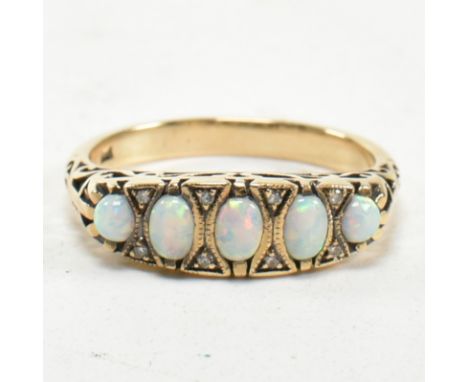 A 9ct gold, synthetic opal and diamond gypsy ring. Stamped 9ct. Size Q. Weighs 2.6g. All weights, measurements and sizes are 