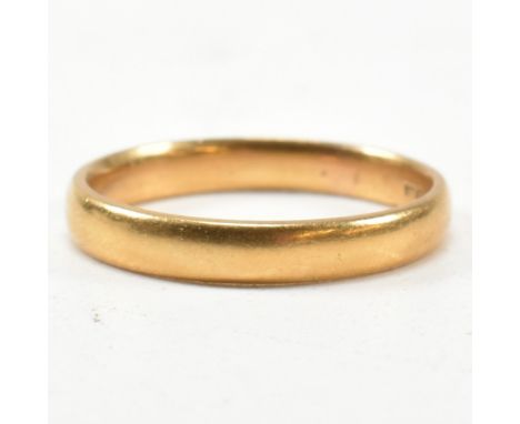 A hallmarked 22ct gold band ring. The ring hallmarked for Birmingham. Size N. Weighs 3.7g.&nbsp;All weights, measurements and