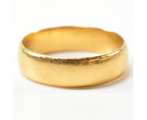 A hallmarked 22ct gold band ring. The band ring hallmarked for Birmingham, 1965. Size O.5. Maker's mark C.G &amp; S. Weighs 4