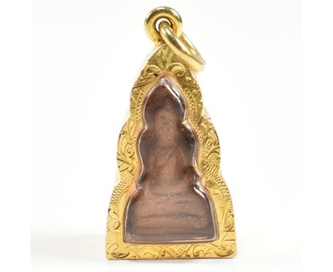 An 18ct gold Thai buddha amulet necklace pendant. The pendant having a Thai buddha encased in an all-over bright cut engraved