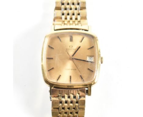 An Omega Gen&egrave;ve triple gold metal gentleman's wrist watch. The Omega Gen&egrave;ve watching having gold lacquer dial, 