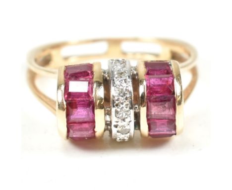 A continental ruby and diamond tank ring. The ring set with a central row of round brilliant cut diamonds flanked by two rows