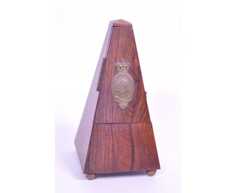 Early 20th century London Metronome De Maelzel. Features a wooden frame, with a brass plaque makers mark on the hinged door o