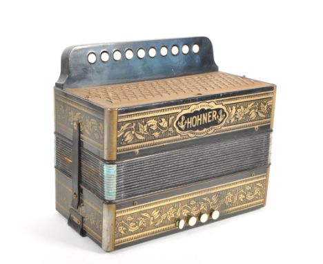Hohner - 20th century vintage German Marca Registrada Accordion with diatonic buttons and leather hand straps. Measuring appr