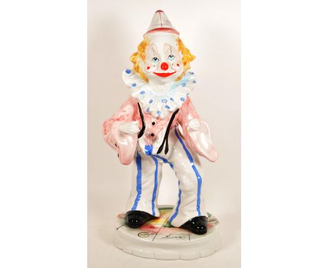 Capodimonte - Large mid century Italian porcelain clown figure. Featuring a pink and blue colourway on a white ground. Clown 
