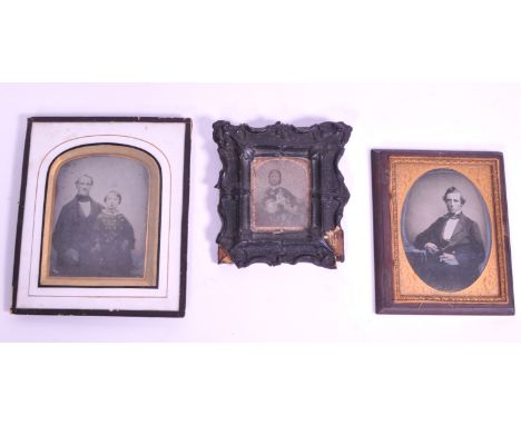 Three 19th century Victorian portrait ambrotype photographs. Comprised of a lady, a gentleman and a man and his son. All fram