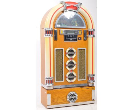 Steepletone - Late 20th century CD rock zero 50 floor standing jukebox player. Features a CD disc slot, a USB port, a radio f