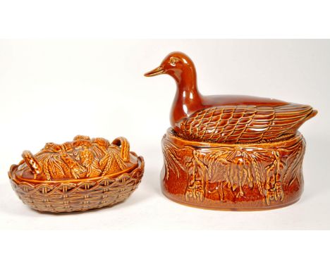 Portmeirion - Two late 20th century pottery lidded oven dishes. Comprised of a twin handled wheat sheaf lidded oval pot and a