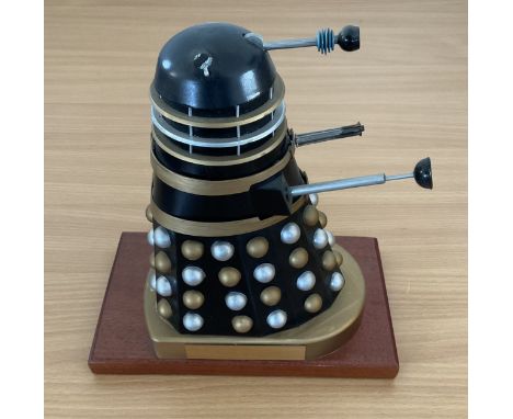 Plastic Dalek on a wooden Plinth with Dr Who and the Daleks plaque manufacturer unknown the lights are missing from its head 