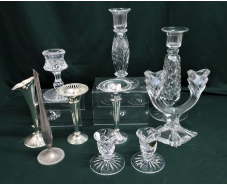 A pair of Waterford lead crystal dressing table candlesticks, an Edinburgh Crystal candlestick three others, four plated cand