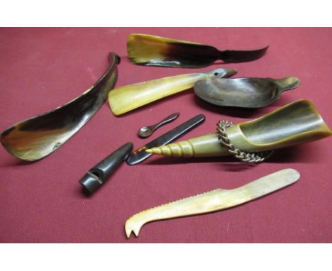 Horn whistle, a carved horn scoop with plated flat curb link mount, three horn shaped horns, horn salt spoon and other treen 