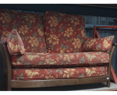 Ercol Renaissance ash-framed two-seater settee with loose rust ground, floral patterned cushions approx H.100cm, D.70cm, W.13