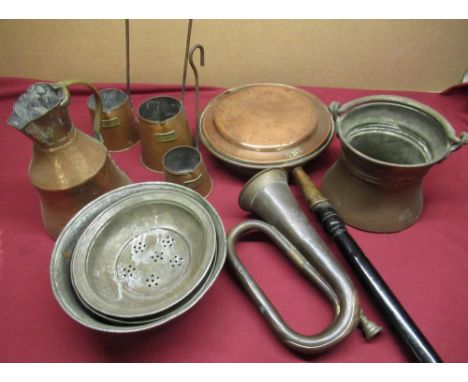 Vintage AA badge No: 4c40346, a copper and brass bugle, three graduated copper cider measures, a 19th C copper warming pan an