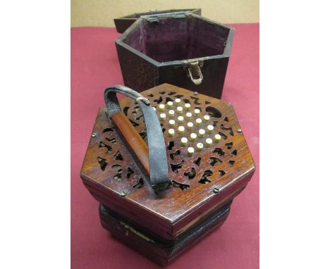19th C Lachenal &amp; Co 46 button concertina, with pierced rosewood ends, Pat No. 4752 with six fold bellows, in hexagonal w