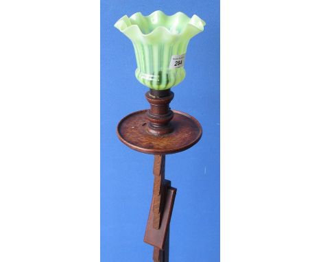 1940's oak standard lamp, adjustable ratchet column support with Victorian green Vaseline glass shade, on tapered rectangular
