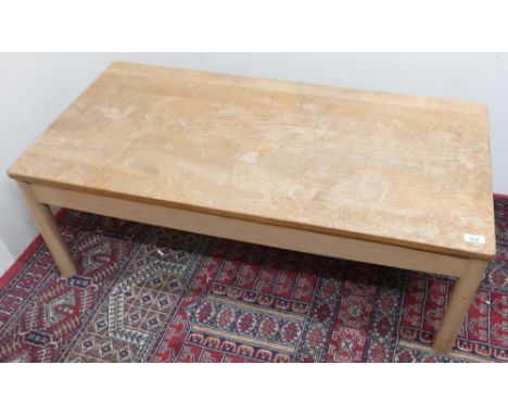 Blond Ercol rectangular low coffee table on turned supports, W107cm D54cm H38cm 