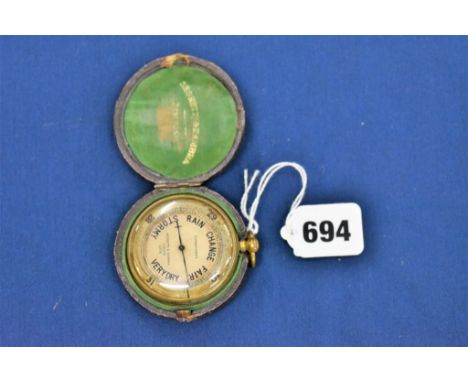 A cased Negretti & Zambra pocket barometer, the reverse inscribed ' In memory of the VAUGHAN TRIO.