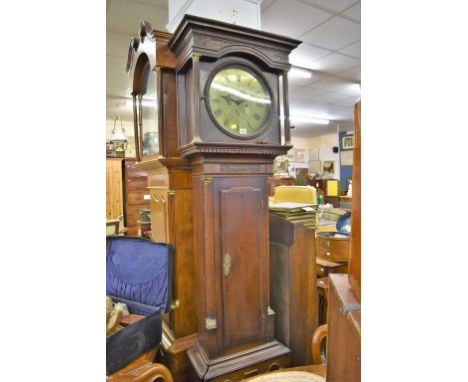 A mid-18th century inlaid oak eight day longcase clock by George Baddely of Newport, the circular 13in. brass Roman dial with