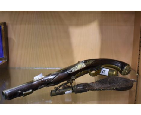 The major parts of an all brass barrelled and furniture flintlock pistol circa 1770 by Brander. Steel lock-work at fault, 8¾"