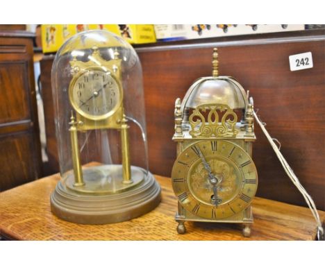 A Smiths lantern clock together with a Schatz 400 day dome clock for restoration. (2)