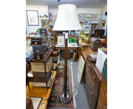 A standard lamp with shade.