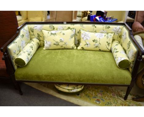 An Edwardian mahogany two seater salon settee & foot stool.