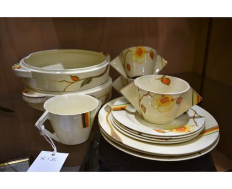 A Clarice Cliff part service in the Yellow Rose pattern c1931 (13) comprising x2 Odilon form tureens (missing lid), x4 7" pla