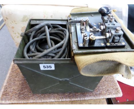 A WW2 British cased signal lamp & morse key with coloured lenses and pole sections.